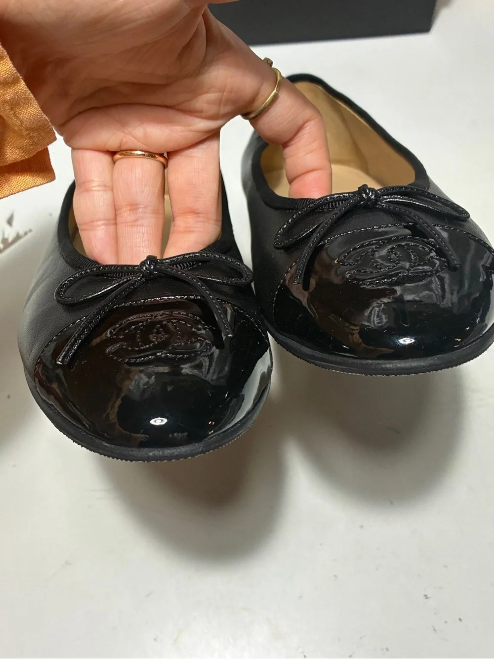 CHANEL Black Leather Cap-Toe Bow Ballet Flats